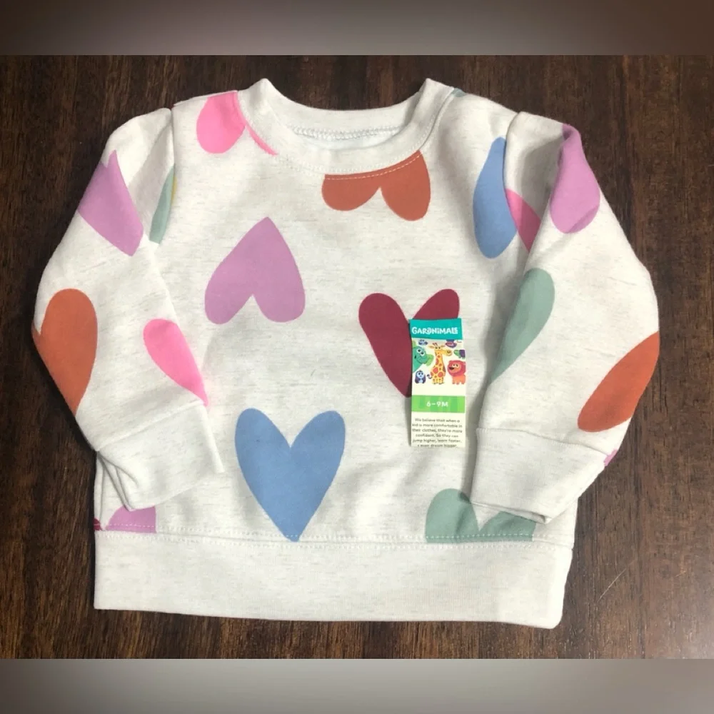 Baby girl’s sweatshirt heart graphic All over crewneck pull over beige.6-9 M